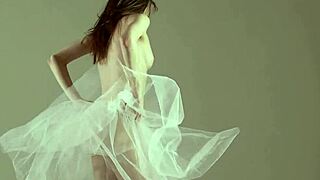 Blonde gymnast shows off acrobatic moves in the gym