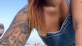 African woman flashes on beach