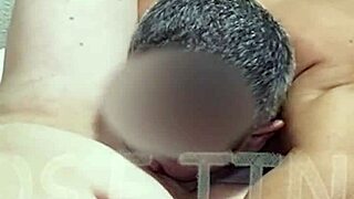 Husband enjoys wife's shaved pussy.