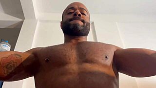 Redhead dom punishes bound sub with dildo