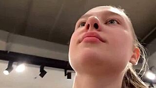 teen masturbates her wet pussy in the changing room, moaning as she reaches orgasm on webcam