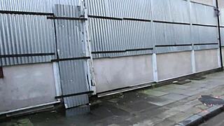 sexy british girl pisses on construction site, flashes tits to workers while walking