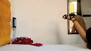 A girl grabs her stepfather while trying on clothes, leading to fucking