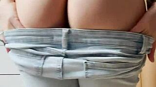 Blonde Striptease in Jeans