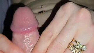 milf tugs cock while riding huge dildo in crotchless panties