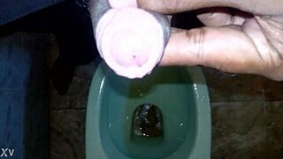 Boy takes a quick pee while the black man handles his own pissing moment outdoors.