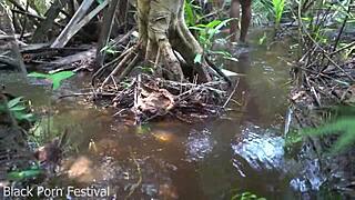 skinny african tribe woman with narrow ass works outdoor in ebony setting