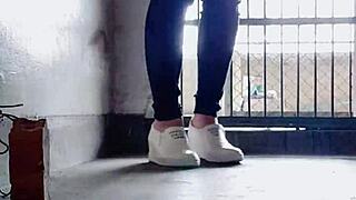 Chinese crossdressing ladyboy masturbates outdoors in stockings during midday urge.