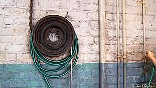 Redhead slave submits to lesbian enema play