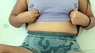 why is this cute student with brown hair exciting her big natural tits at home after school?