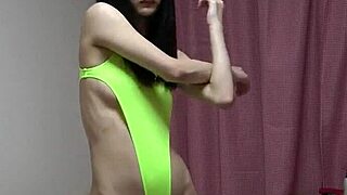 Petite asian girl changes from high-cut leotard to string bikini on webcam