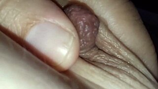 Brunette with natural tits expresses milk from her nipples using a balloon technique