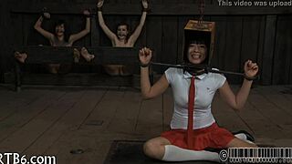 Four angels gather inside a tiny 18+ cage for a unique display. Details include their positions and interactions within the confined space.