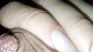 Brunette with natural tits expresses milk from her nipples using a balloon technique