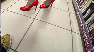 Spying upskirt in public store reveals gorgeous ass and nylon pantyhose legs?