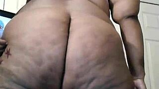 63-inch huge booty on black mature ebony with big ass details in close-up view.