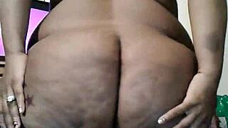 63-inch huge booty on black mature ebony with big ass details in close-up view.