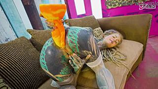 hey, check out this tattooed girl going solo with a big dildo in sexy fishnets, high heels, and stockings... her petite frame and piercings make it wild