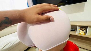 the latina colombian wife with huge cameltoe and big natural tits flashes her chubby body while doing household chores