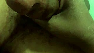 my wife gives a quick handjob leading to a messy cumshot in this short clip