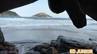 Asian Babe with Big Ass Gives Blowjob to Big Cock in Outdoor Nudist Beach Scene