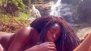 Ebony goddess enjoys an interracial encounter with a Latina teen pornstar in a public waterfall setting
