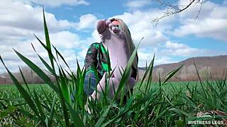 Goddess Feet in Cute White Socks and Jeans on Spring Grass Field