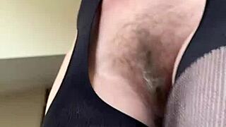 hey, check this hairy milf doing her fetish workout in fishnets at the gym