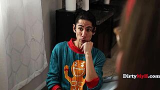 Step family lines up under the christmas tree.