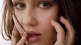 Alluring brunette Czech Sophie Limma strips to show big natural boobs.