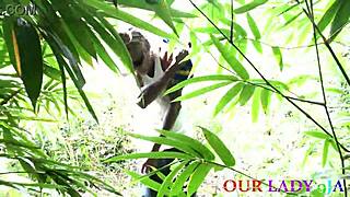 Nigerian BBW housewife, caught in bush by vigilante, takes BBC doggystyle outdoors.