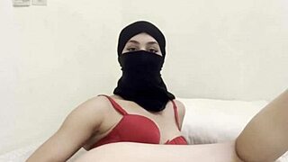 Hey, watch this shy Arab girl in niqab gently masturbate her juicy pussy.