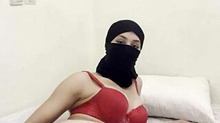 Hey, watch this shy Arab girl in niqab gently masturbate her juicy pussy.