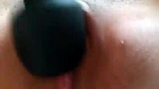 Horny Latina girl stimulates shaved virgin pussy with vibrator outdoors.