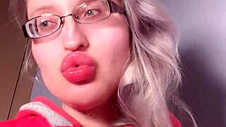 I worship bimbo girl with red lips and lipgloss in webcam domination session