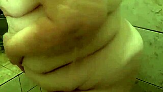 Curvy amateur bbw wife gets caught solo in shower with natural tits