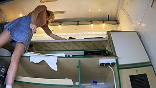 the amateur blonde reveals her shaved pussy when panties move aside under skirt outdoors