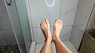 early morning foot job on cock during homemade shower with milf in bathroom