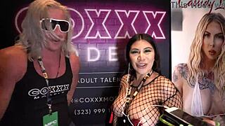 Tokyo Lynn shares insights in interview at Miami Exxxotica 2022 at Coxxx Models booth