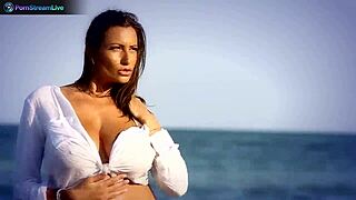 Why is busty brunette Sensual Jane fingering solo at the beach?