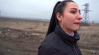 Stunning brunette in leather leggings masturbates solo to orgasm in car with ponytail and long hair.