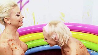 Slippery when wet lesbians are finger fucking in a pool filled with jello and getting wild orgasms!