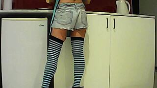 latina brunette grabs a banana in the kitchen before handling a big item with her curvy friend