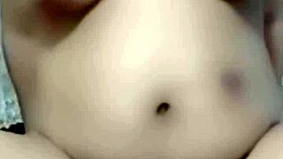 Amateur housewife with big tits and hairy pussy goes solo in softcore masturbation as pornstar