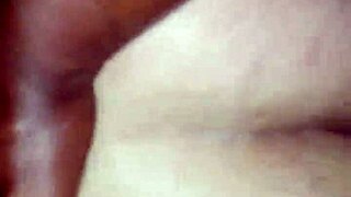 Petite brunette rides pink toy then licks her shaved pussy juices off it