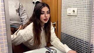 What happens when a cute horny petite teen with natural tits gets a cumshot from her boss in the bathroom?