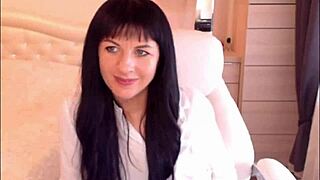 Small tit brunette Helga Muah aka Jessy in lingerie and stockings does sexy striptease and tease.