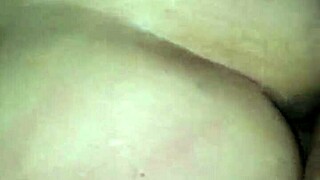 Petite brunette rides pink toy then licks her shaved pussy juices off it