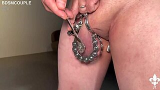 the toy part 2 unfolds with femdom goddess spanking slave in cage, featuring anal fingering and group humiliation through toys