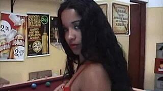 What a naughty brunette flashing her natural tits in the public bar! She's all naked in the outdoor bathtub, so wild!